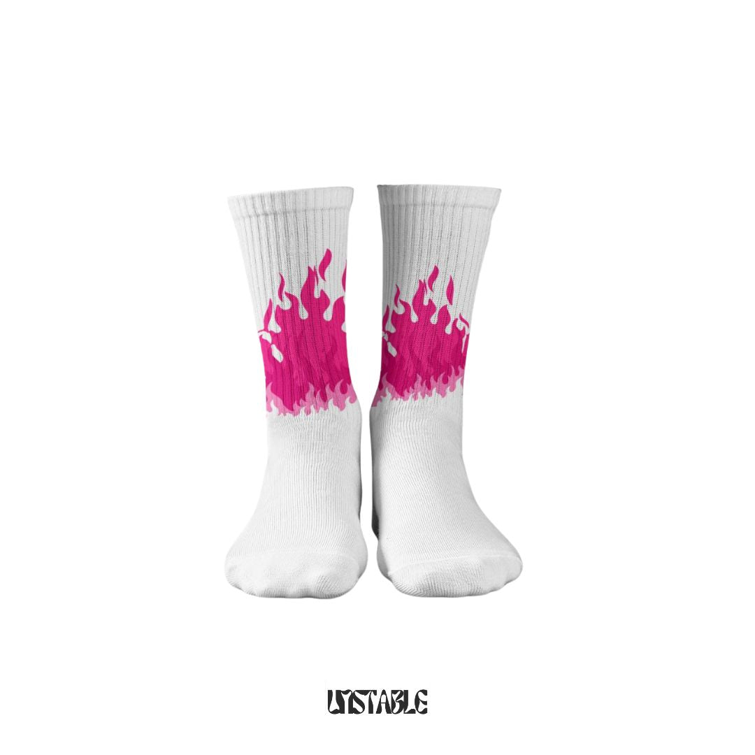 White socks with pink flame design on a white background