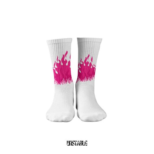 White socks with pink flame design on a white background