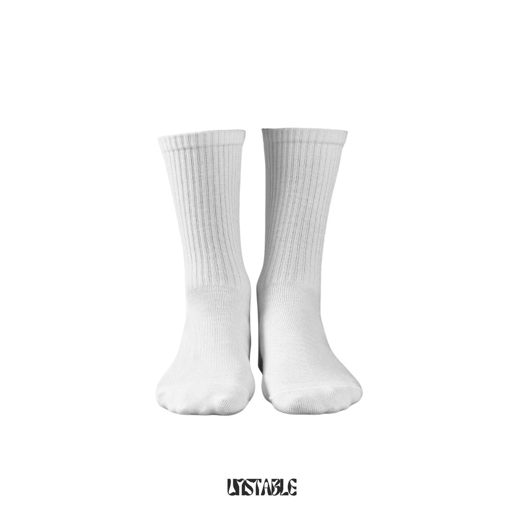 Pair of white socks on a white background with a brand logo at the bottom.