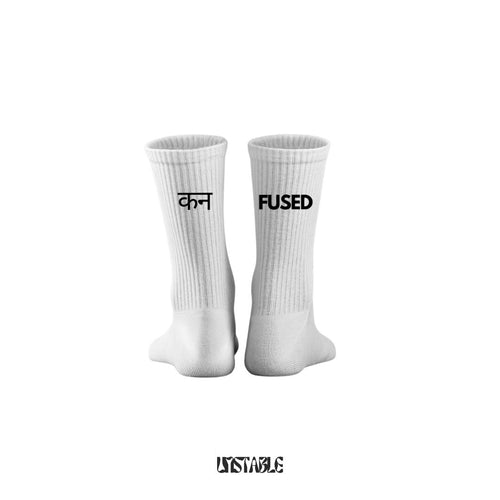 White crew socks with confused text design  on a white background
