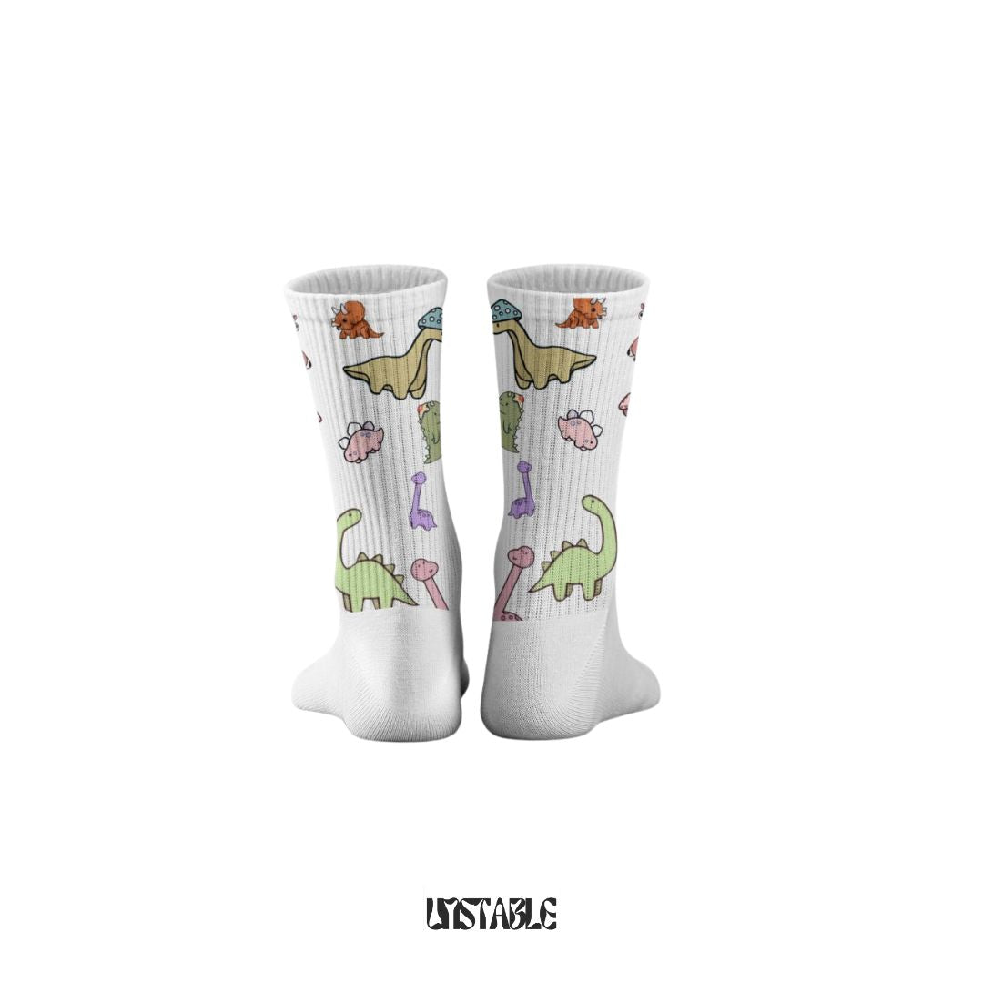 White socks with colorful dinosaur pattern on a white background