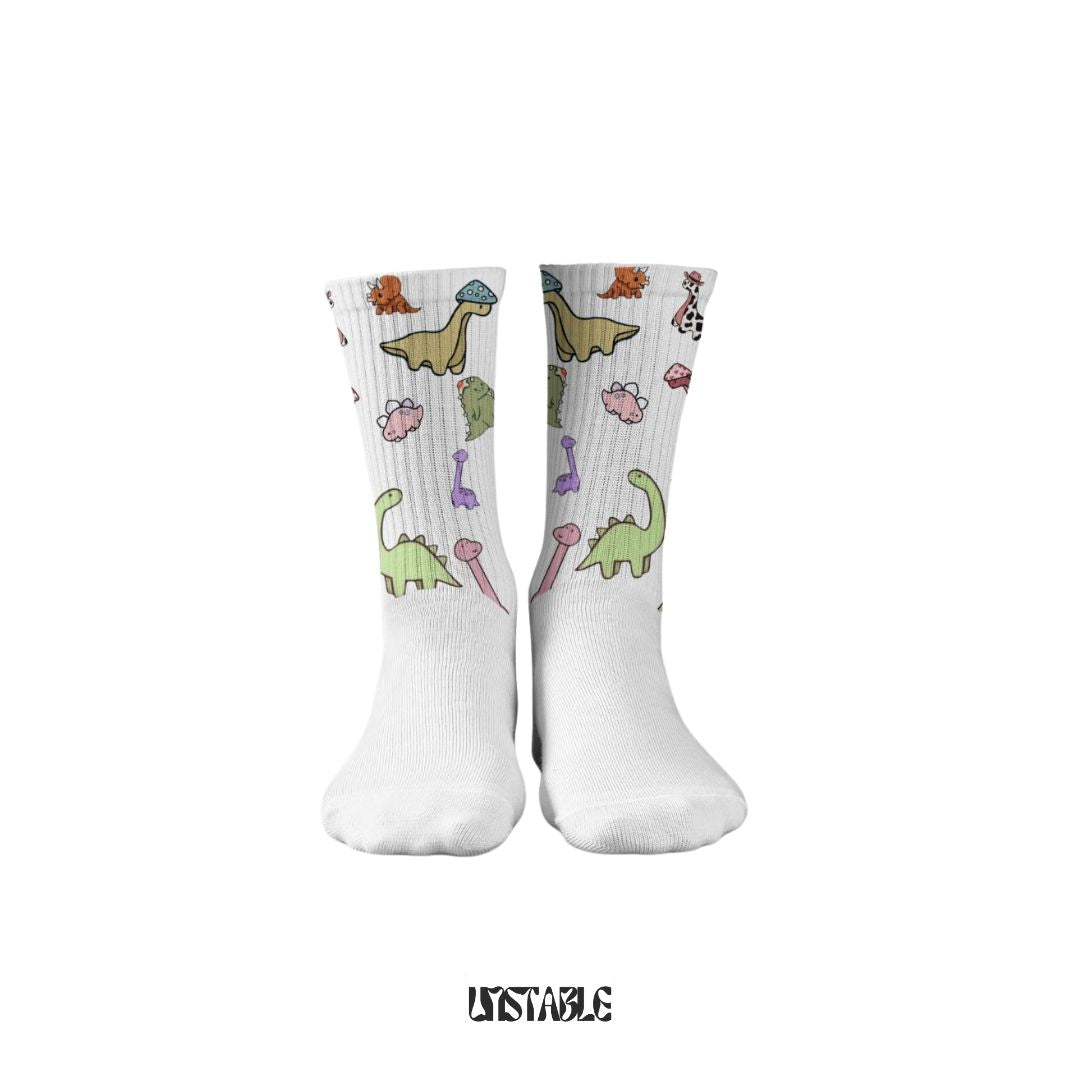 White crew socks with cute dinosaur pattern on a white background