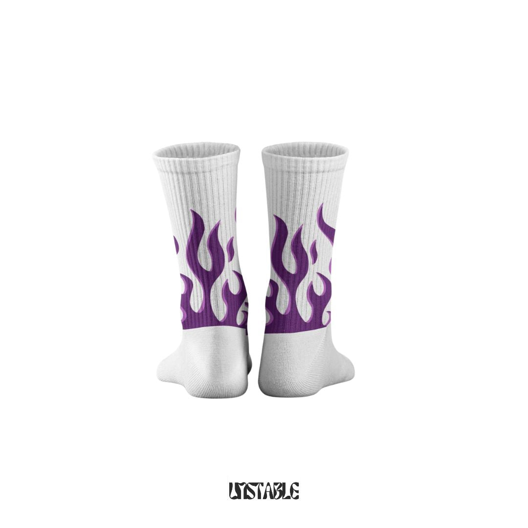 White socks with purple flame design on a white background