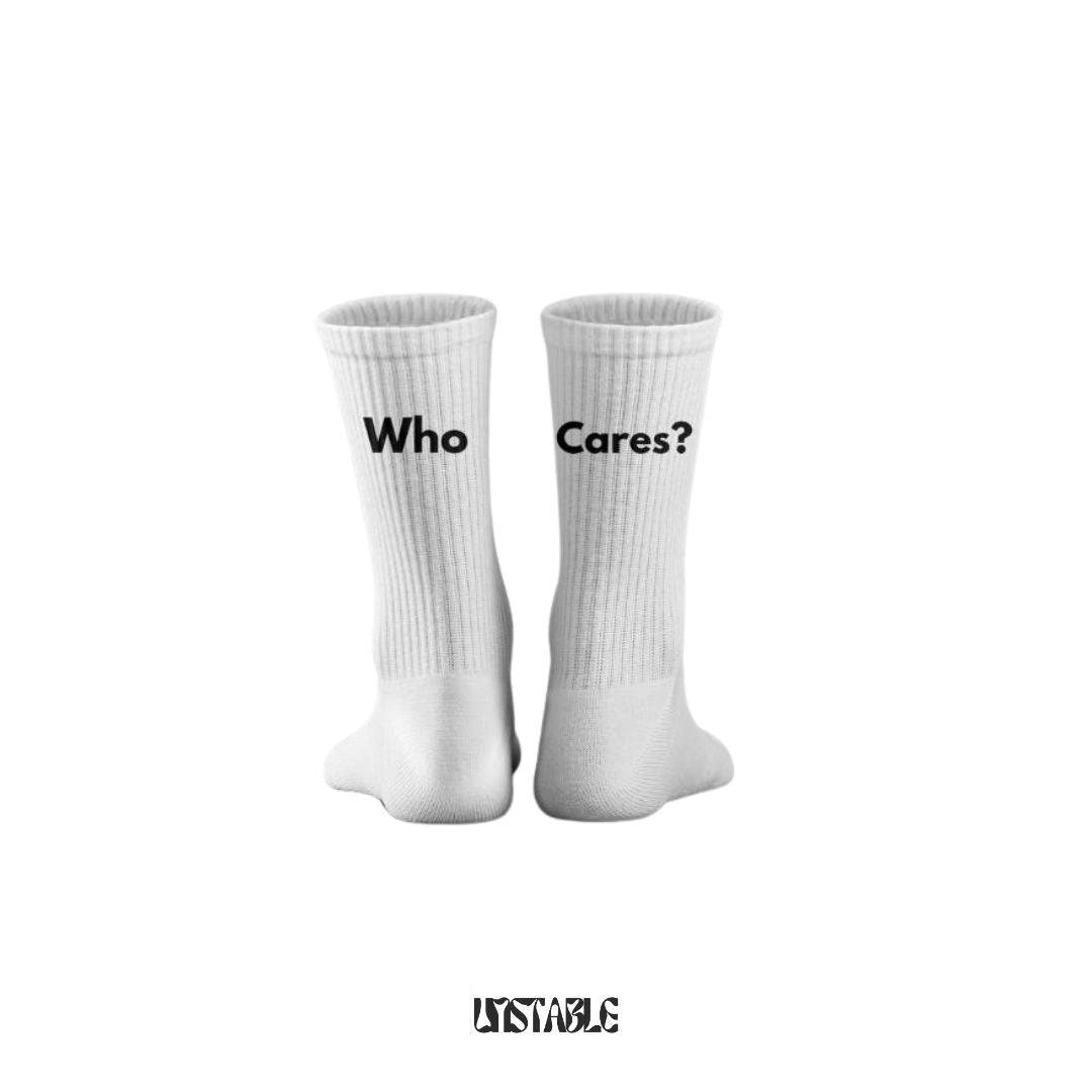 White socks with 'Who Cares?' text on a white background